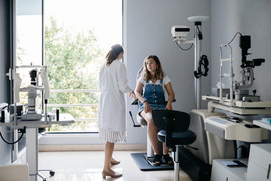 Female doctor talking with the patient