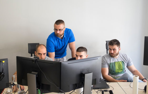 Young male developer working in the office