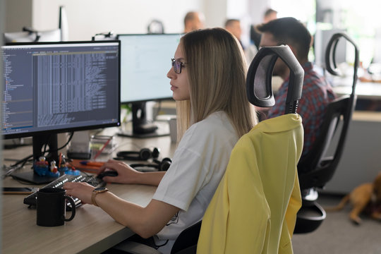 Young male developer working in the office
