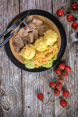 Braised pork tongues in horseradish sauce.