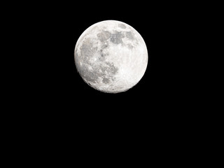 Full moon on black sky background