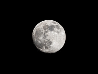 Full moon on black sky background