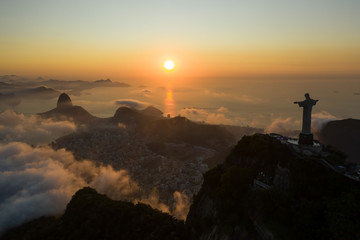 Drone view of Christ the Redeemer during the sunrise over Guanamara Bay in Rio de Janeiro