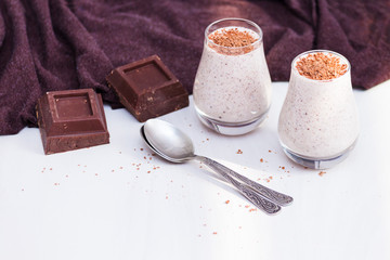 Chocolate chia pudding in glass. Healthy organic snack with omega 3.