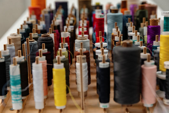 Collection of multicolored thread spools
