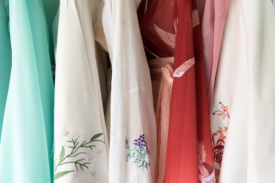 Traditional Chinese dresses hanging - Powered by Adobe