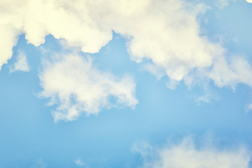 Beautiful photo of a blue sky with lots of white clouds. Abstract background for sites and layouts.