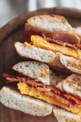 delicious and appetizing breakfast: a bagel stuffed on a plate
