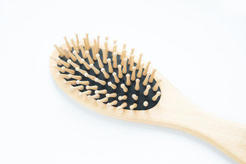 Wooden combs on a white background, top view
