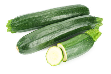 fresh green zucchini slices isolated on white background