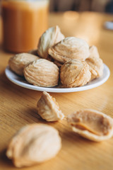 Homemade cookies with boiled condensed milk on a table background. Copy space