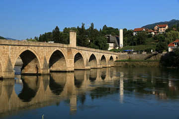 Fototapeta premium Mehmed Pasa Sokolovic Bridge, historic bridge in Visegrad, over the Drina River in eastern Bosnia and Herzegovina