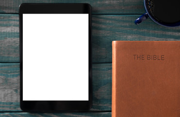 A Tablet with a Bible for LIve Streaming Church Services or Bible Study