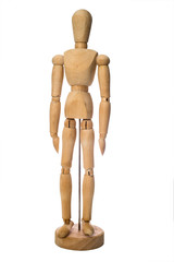 Wooden mannequin stands on a white background
