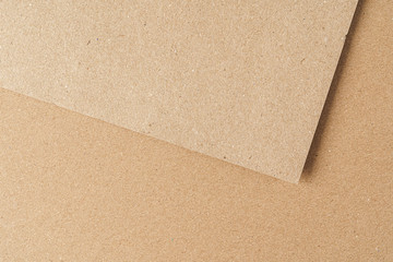 Brown recycled carton paper sheets close up. Business concept