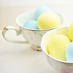 colorful easter eggs in cup