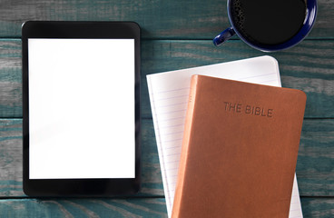 A Tablet with a Bible for LIve Streaming Church Services or Bible Study