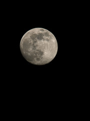 Tonights waxing Gibbous moon as seen from Wakefield Cemetary. The moon is 97% of a full moon ahead of Aprils Pink full moon. Wakefield, Yorkshire, 6th April 2020.