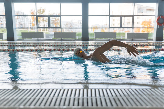 Man swimming in crawl style