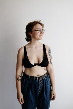 Woman in glasses looking away