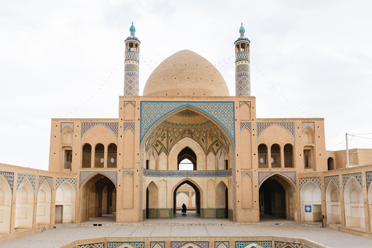 Silhouette of a woman walking in the Shiite Mosque of Kashan