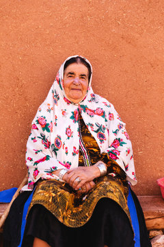 Portrait of an elderly woman with traditional clothes