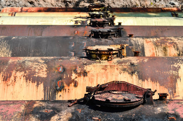 Large tanks in the excavated quarry for storage of petroleum products. Background
