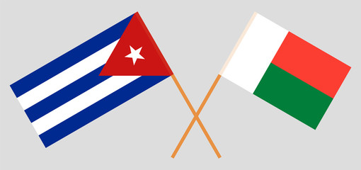 Crossed flags of Madagascar and Cuba
