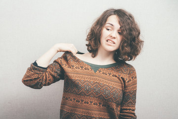 Woman pulls the collar