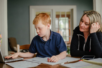 Boy Checking Assignment