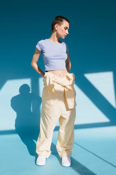 Female model standing under sunlight