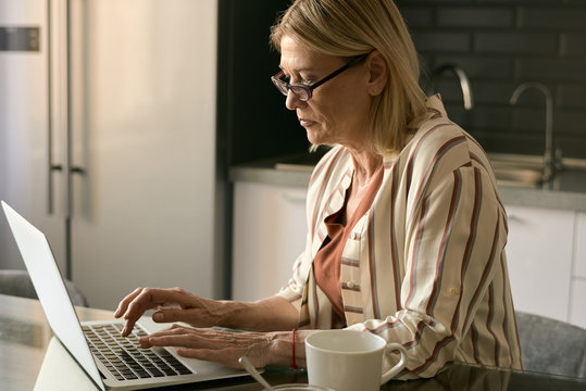 Senior Businesswoman Using Laptop