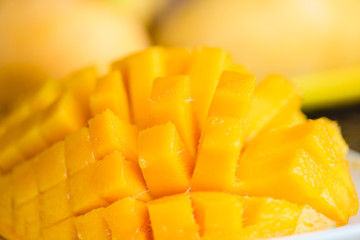 Close-up of chopped yellow juicy mango