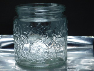 glass jar on black background