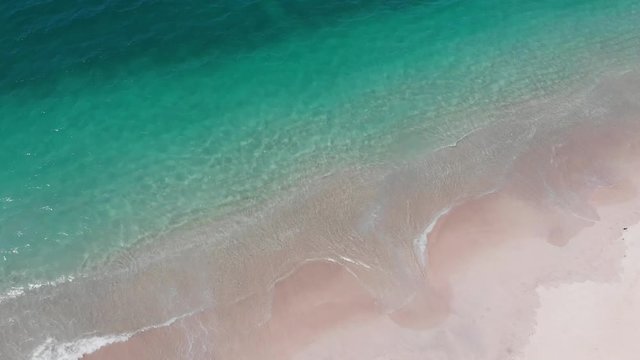 Aerial View of waves crashing on the shore of Conchal Beach, Guanacaste, Costa Rica