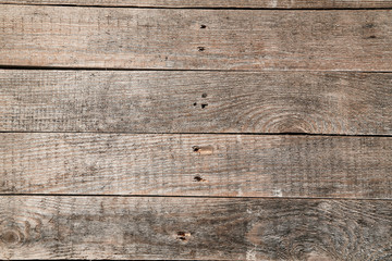 Wooden texture backdrop. Natural wood planks background, copy space. Top view of timbered rough...