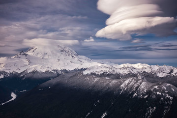 Massive Lenticular Clouds form over Snowy Mt Rainier