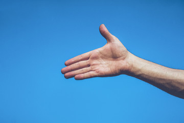 hand of the man. Sky background. Hand