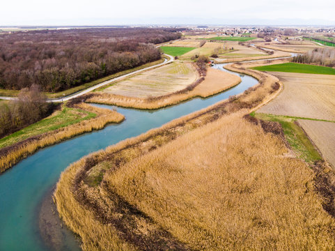 Italy, Friuli Venezia Giulia, Marano, Aerial view of Venetian Lagoon and countryside fields in autumn