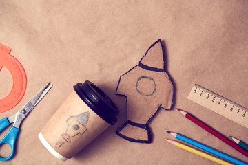 Hobby, new learning and New Life. Skill and self development. Paper with rocket painting. Coffee...