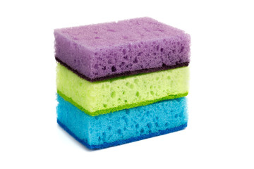 Obraz na płótnie Canvas Bright multi-colored sponges for sanitary work, washing dishes, cleaning the bathroom and other household needs. The need for disinfection during the COVID-19 epidemic. Isolated.