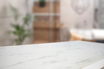 table background of free space and blurred home interior 