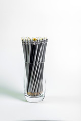 Simple pencils for office workers. Pencils for drawing. The pencils are in the glass.