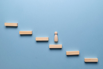 Human resource concept in business to business. Wooden blocks on a blue background.