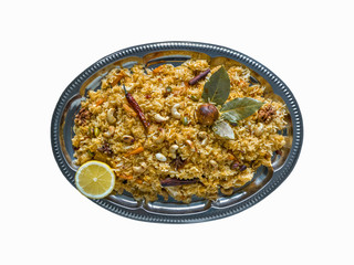 Isolated Vegetarian Kabsa with rice, nuts and vegetables. Ramada