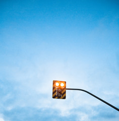 traffic light on the blue sky