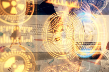 Double exposure of man and woman working together and technology theme drawing. Computer background. Top View. High tech concept.