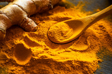 Turmeric root and powder spice. Natural antioxidant