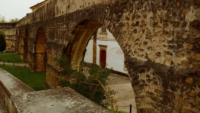 Tracking shot along the popular San Sebastian Aqueduct, also known as Garden Aqueduct, dating back to 1570 in Coimbra, Portugal