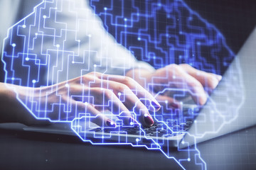 Multi exposure of woman hands working on computer and human brain hologram drawing. Ai tech concept.